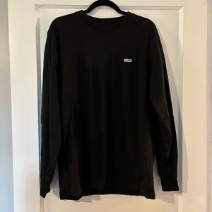 Supreme long sleeve black tee with silver metallic logo